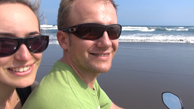 Riding motorbike on a tropical beach