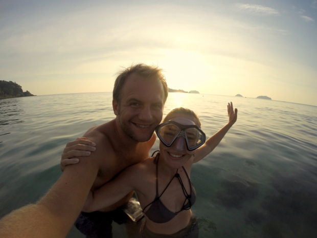 Us in the sea at sunset